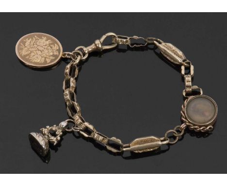 9ct fancy link bracelet, with a 9ct double sided carnelian / compass fob, an unmarked amethyst fob eangraved 'Anna' and an un