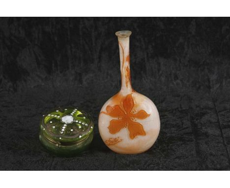 A Galle cameo glass flask decorated in orange with clematis together with a small green glass Art Nouveau bowl and cover with