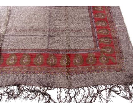A fine mid 19th century silk Paisley shawl probably Chinese picked out in silver thread within paisley type border and hand s
