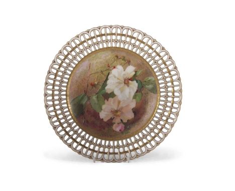 A 19th century Minton plate the centre finely painted with flowers and signed by R Pilsbury within reticulated borders23cm di