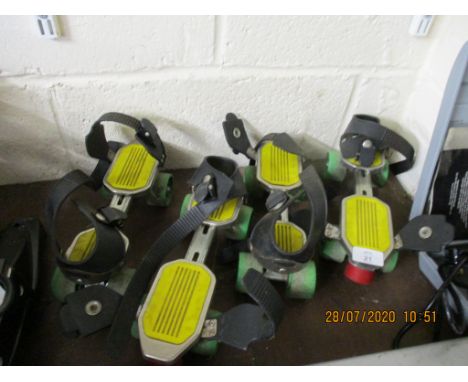 TWO VINTAGE PAIRS OF ROLLER SKATES