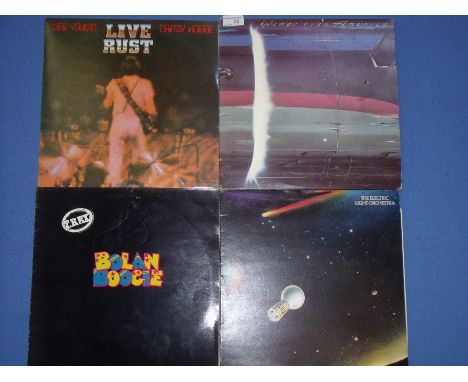 Four LPs including 'Wings over America' a triple LP album, 'Neil Young Live Rust', 'T-Rex Bolan Boogie' and 'The Electric Lig