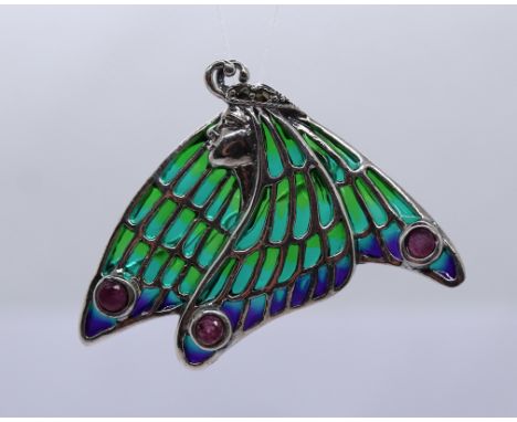 Silver pendant/brooch set with ruby 