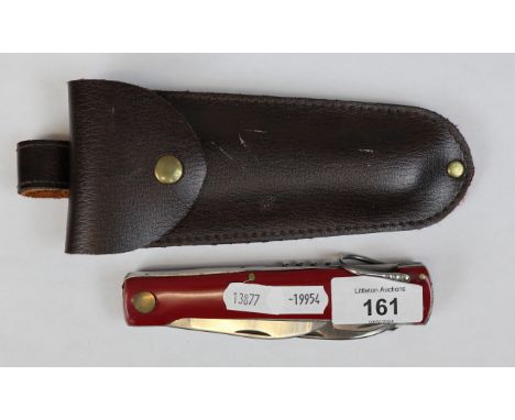 Swiss Army knife in leather sheath 
