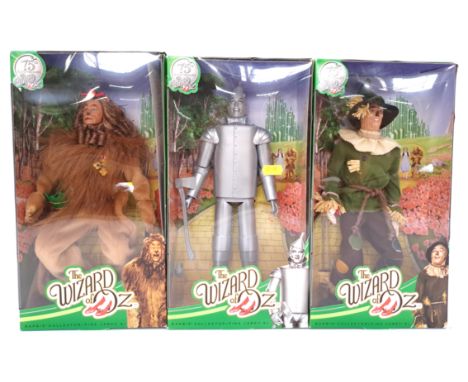 Mattel, a boxed trio of The Wizard of Oz 75th Anniversary Dolls. Includes Cowedly Lion, Tin Man and Scarecrow. Although unche