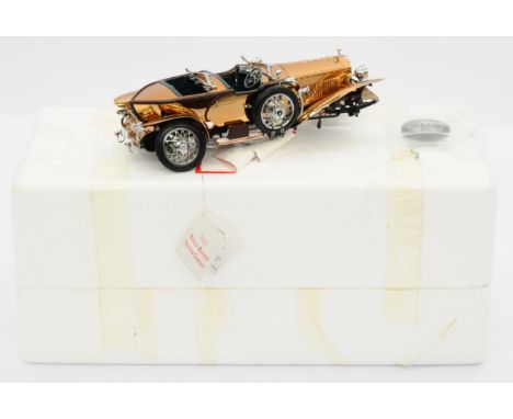 Franklin Mint a boxed 1/24 scale car to include 1921 Rolls-Royce Silver Ghost (Bronze). Some parts have been broken but may b