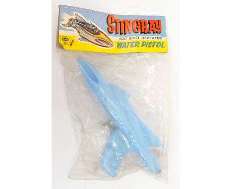 Fairylite vintage Gerry Anderson Stingray 100 Shot Repeater Water Pistol, within Good Plus packaging, overall Excellent.