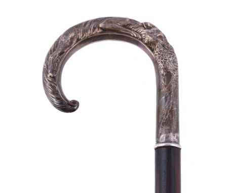  A silver mounted walking stick by W. I. Broadway  &  Co.,   Birmingham 1981, the handle modelled with a fox with a pheasant 