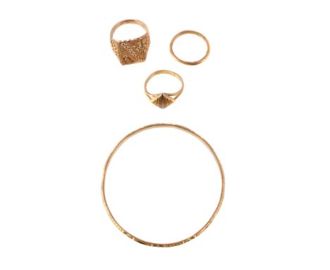  A small collection of gold coloured jewellery,   comprising a bangle stamped 916; a 22 carat gold band ring; a ring stamped 
