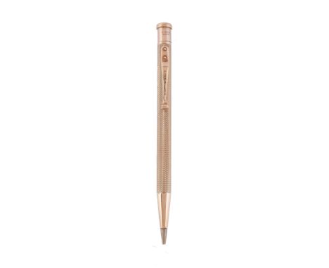  A 9 carat gold propelling pencil by E. Baker  &  Son,   for Yard-o-Led,  Birmingham 1949, with engine turned decoration, sta