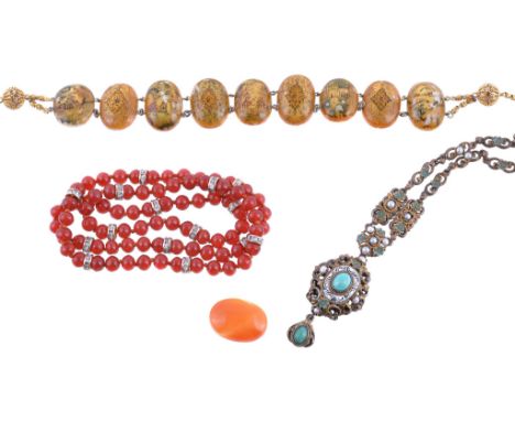 An Austro Hungarian necklace,   the scrolling panel set with an oval cabochon simulated turquoise, with black and white enam