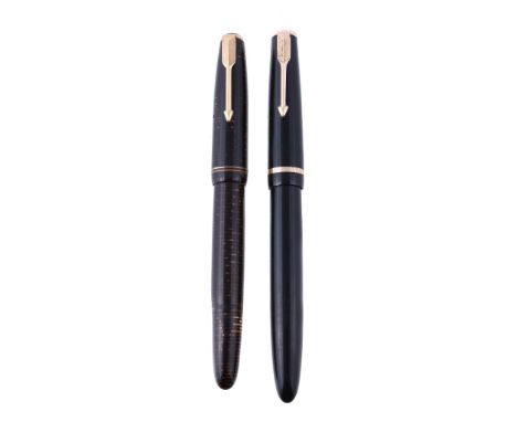  Parker, Duofold, a black lacquer fountain pen,   the cap with a gilt metal arrow clip and cap band, the nib stamped 14K, wit