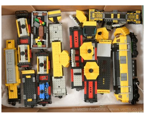 Lego Railway a mixed group of items to include 7939 yellow Cargo Diesel Type Locomotive and with various Trucks and Rolling S