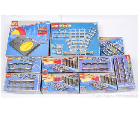 A boxed set of Lego track to include 4548 electric transformer, 4531 manual points, (see photo) - All previously used set wit