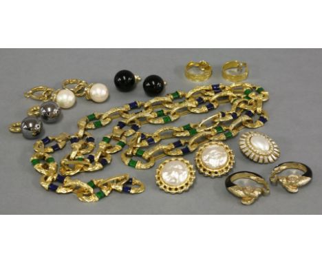 A gold-plated necklace and bracelet suite,by Kenneth J Lane, with textured large oval links, decorated with a band of green o