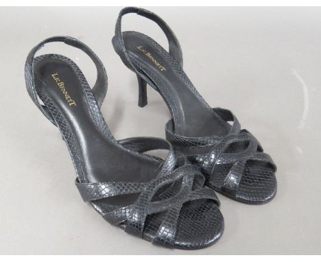 A pair of L K Bennett of London black leather strappy sandals,size 40, in original bag