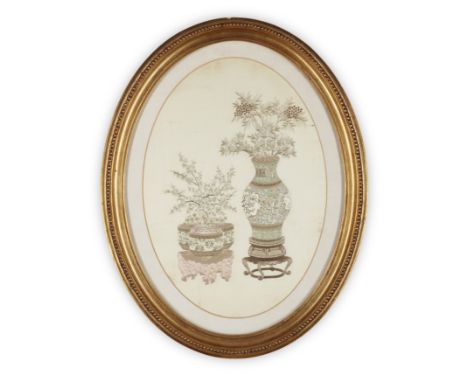 A Chinese embroidery of a vase and jardinièreQing dynasty, 19th centuryIntricately embroidered with a prunus in a tripod jard
