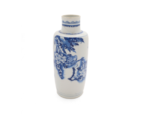 A Chinese blue and white rouleau vaseQing dynasty, Kangxi periodPainted to the body with a mythical beast amidst antique obje