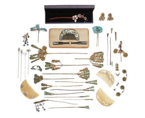 A group of Chinese hair ornaments19th century - modern eraComprising: nineteen gilded white metal hairpin mounted with jadeit
