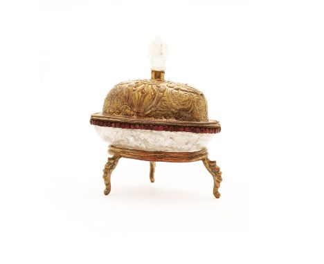 A Sino-Tibetan gilt copper-mounted rock crystal 'kapala' cup19th/20th centuryThe vessel with gilt metal mount at the rim inse