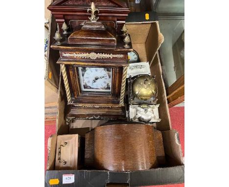 A collection of clocks to include a1930s oak cased mantel clock, and quartz lantern clock