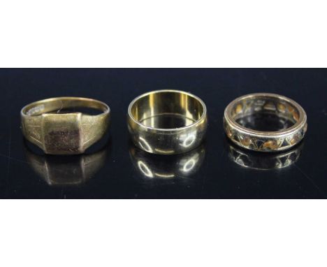 A 9ct gold, blue and white sapphire set band ring (heavily worn), size L, 3.1g; together with a base metal signet ring, and a