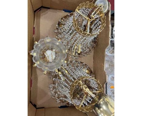 A pair of polished brass and cut glass three-light ceiling lights, dia.26cm; together with a hanging candle holder (3)