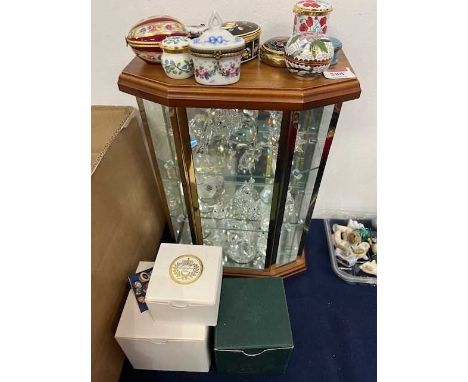 A collection of Swarovski crystal animal figures, to include an elephant and an owl; together with various pill/patch boxes t