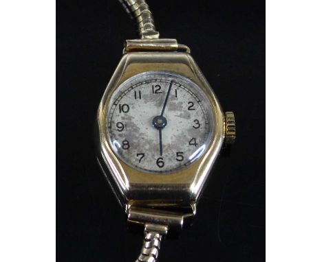 A lady's vintage 9ct gold cased manual wind wristwatch, case dia.1.8cm, on a 9ct gold snake link bracelet with hinged deploym