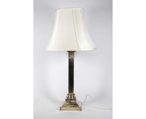 A silver plated table lamp, in the form of a Corinthian column, h.76cm (including shade)Height 46cm