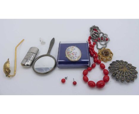 A small collection of miscellaneous items to include a white metal boxlink necklace, a filigree worked brooch, beaded necklac