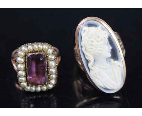 A mid-19th century style 9ct gold carved shell cameo ring, of good size, the oval cameo measuring 30 x 15mm, size Q; together