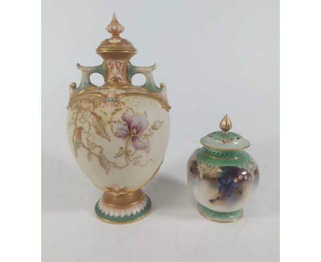 A Royal Worcester porcelain vase and cover, shape 1654, puce mark and RD number to the underside, height 23.5cm, together wit