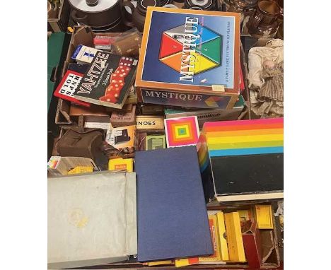 A box of games together with another containing photography items including a Polaroid camera, slides etc 