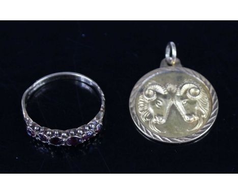 A yellow metal Zodiac pendant for Aries, indistinctly marked but tests as approx 18ct gold, 2.1cm, 2.5g; together with a 9ct 