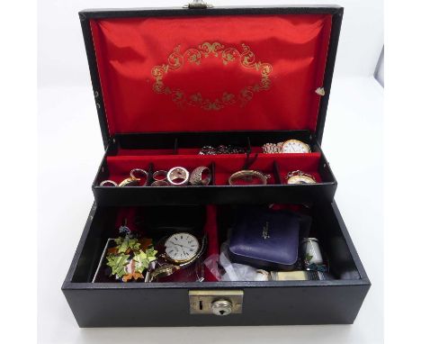 A leather clad jewellery box containing various items of costume jewellery to include paste set silver dress ring, lady's Pul