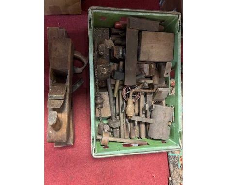 A box of tools to include planes, saws etc 