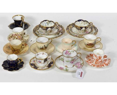 A collection of twelve various coffee cans, to include Coalport and Royal WorcesterSmall hairline crack to one cup, some mino