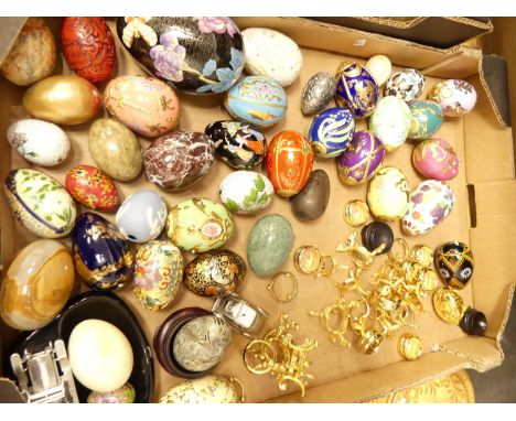 14733A collection of egg ornaments, to include cloisonne enamel, polished hardstone and porcelain examples 