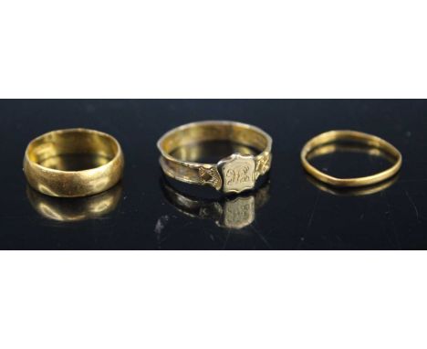 A 22ct gold court shaped wedding band, size J/K; together with a 22ct gold narrow wedding band, size L, 3.4g; and a 9ct gold 