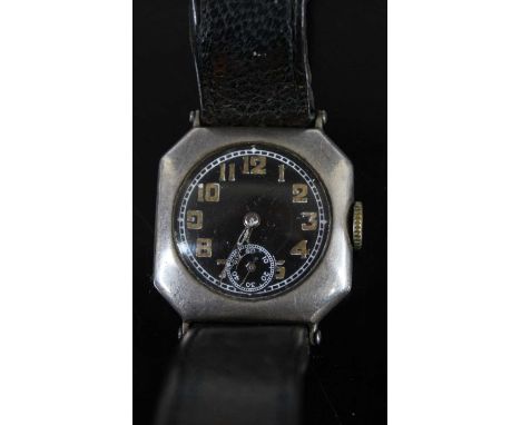 A vintage silver cased wristwatch, having a black luminous Arabic dial, manual wind movement, case w.26mmThe watch winds, tic