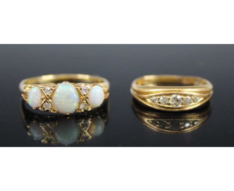 A vintage 18ct gold diamond set half-hoop ring, arranged as graduated old cuts in an elliptical setting (band badly twisted);