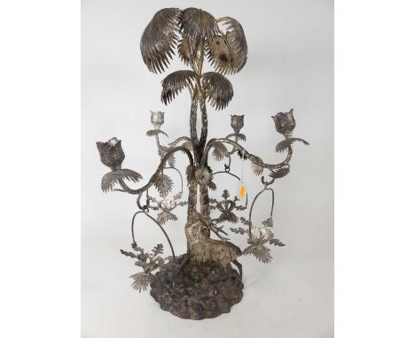 A large Victorian style silver plated table epergne, in the form of a stag beneath a tree, lacking glass, h.64cm