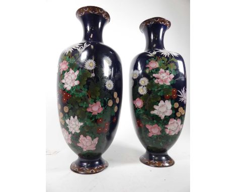 A pair of Japanese cloisonne enamel decorated vases, each h.46cmBoth with small cracks and dents to rims.One vase heavily dam