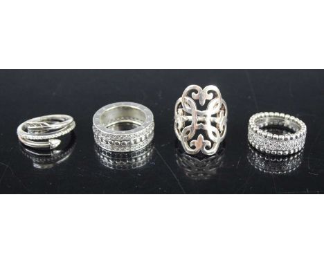 A Pandora silver and paste set eternity ring; together with three other contemporary silver dress rings (4)