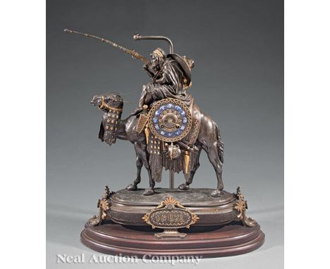 Antique French Gilt and Patinated Metal Figural Mantel Clock, c. 1880, movement marked "Gardien a Chern/ Paris", figure of an