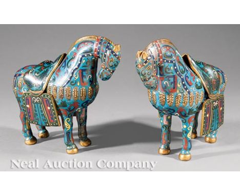 Pair of Chinese Cloisonné Enamel Horses, 20th c., modeled standing with removable saddles on their backs, h. 9 1/8 in., w. 10
