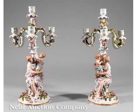 Pair of Antique German Porcelain Figural Three-Light Candelabra, scrolled arms, mother and child standards, encrusted with ro