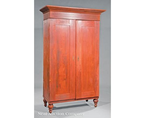 Good Louisiana Gros Rouge Armoire, early 19th c., flared cornice, plain frieze, two paneled doors, shelf interior, molded bas
