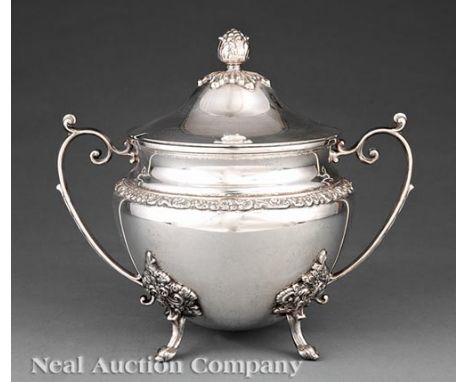 English Silverplate Covered Soup Tureen in the Late Georgian Taste, two handled circular form raised on four scroll supports,